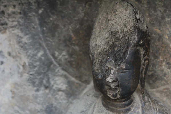 Détail de Bouddha en pierre sculptée — Photo