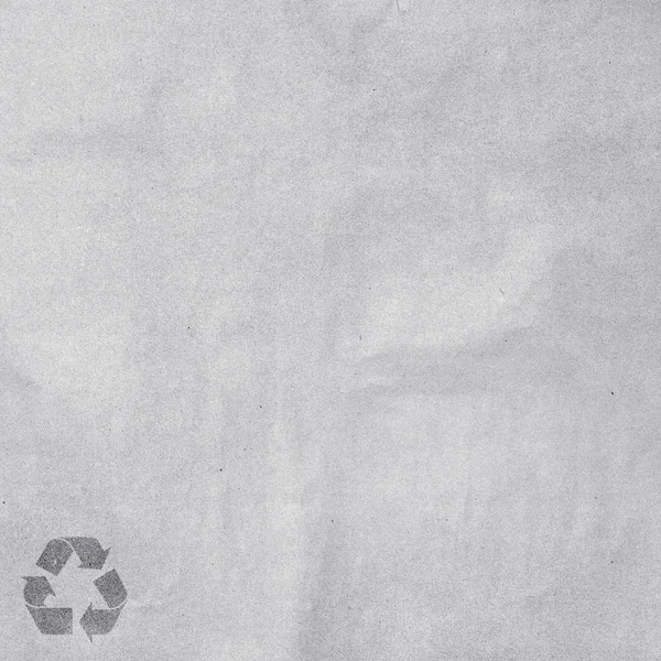 Blanco papier met recycle teken — Stockfoto
