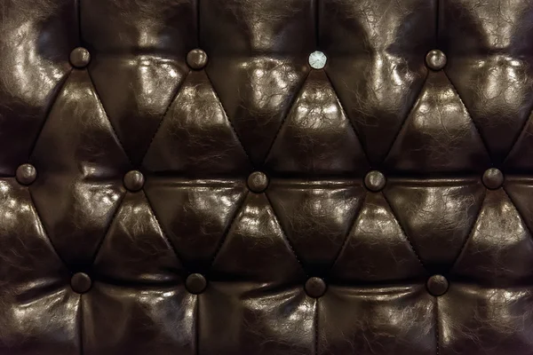 Brown leather texture of sofa closeup shot — Stock Photo, Image