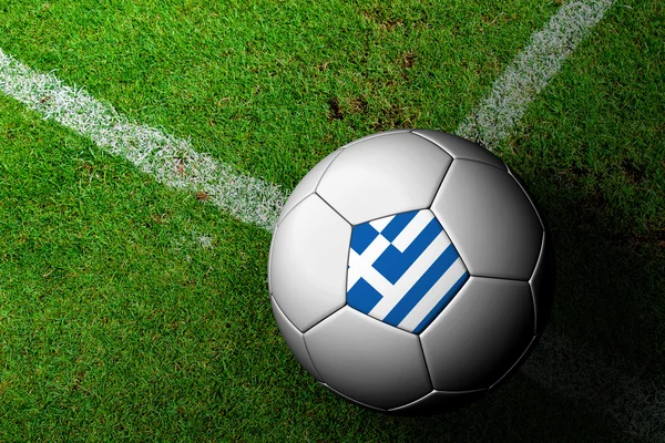 Greece Flag Pattern of a soccer ball in green grass — Stock Photo, Image