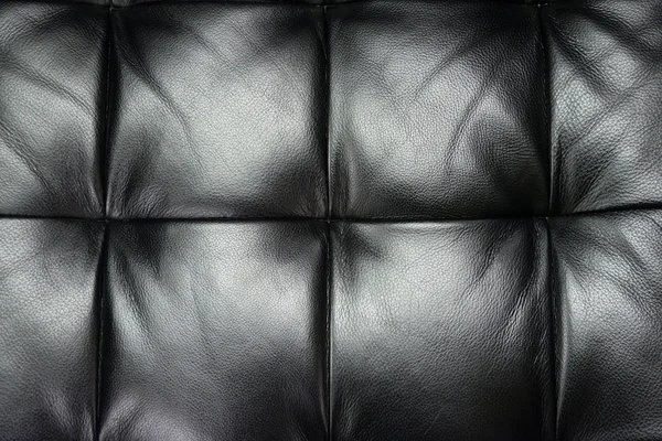 ソファのクローズ アップ ショットの暗い革テクスチャ — ストック写真