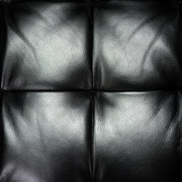 Dark leather texture of sofa closeup shot — Stock Photo, Image