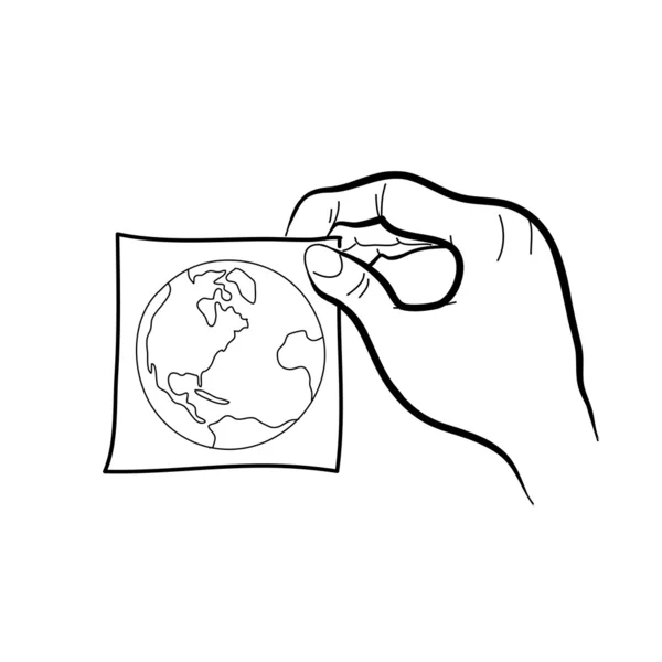 Ruka držící papírové nálepky s planetou — Stockový vektor