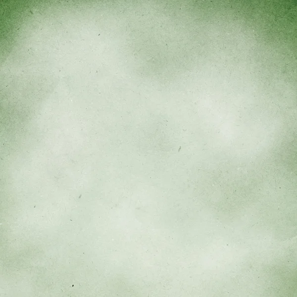 Зеленый гранж бумажный фон — стоковое фото