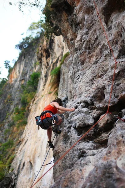Rock climbing woman