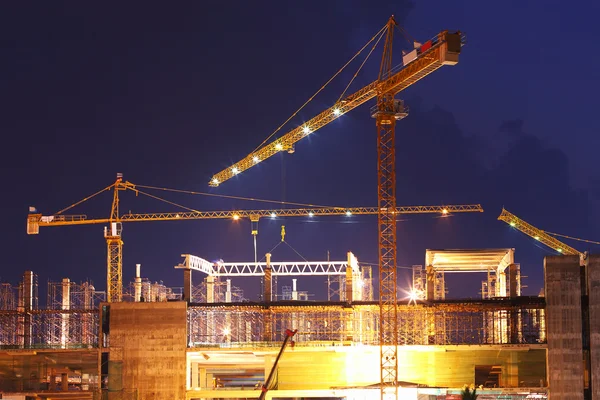 Crane and construction site twilgiht — Stock Photo, Image