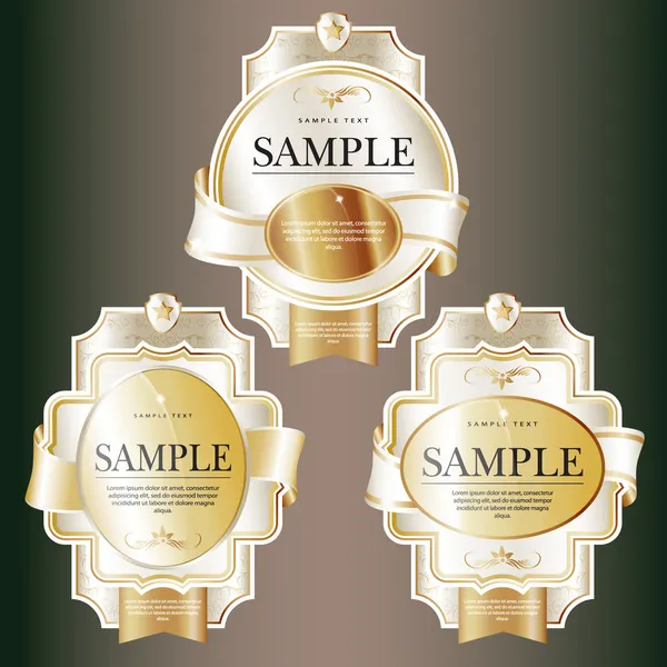 Set of white ornate labels with Gold Tapes. — Stock Vector