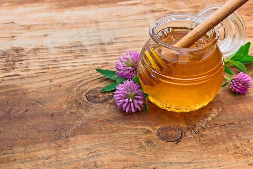 Honey and flowers Stock Photo by ©Aishun 33485471