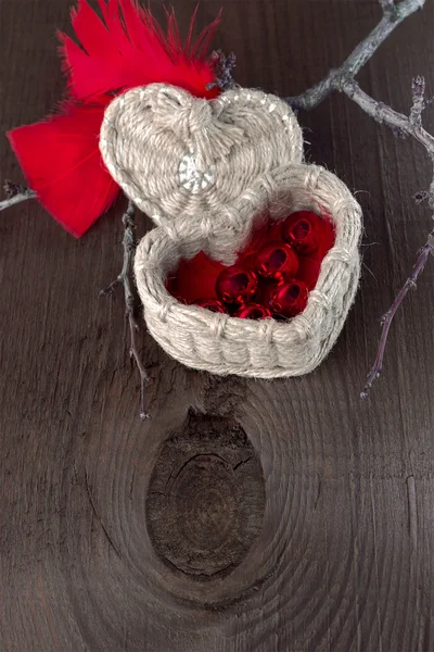 Basket with beads and a branch — Stock Photo, Image