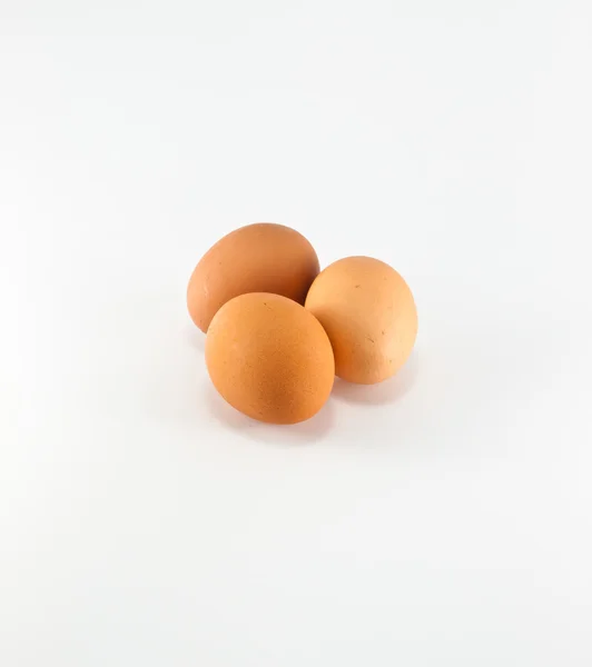 Tre uova isolate su fondo bianco — Foto Stock