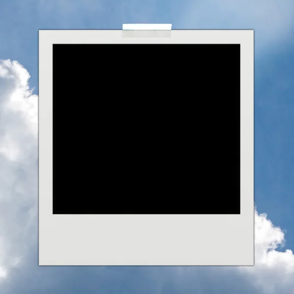 Instant photo on sky background — Stock Photo, Image