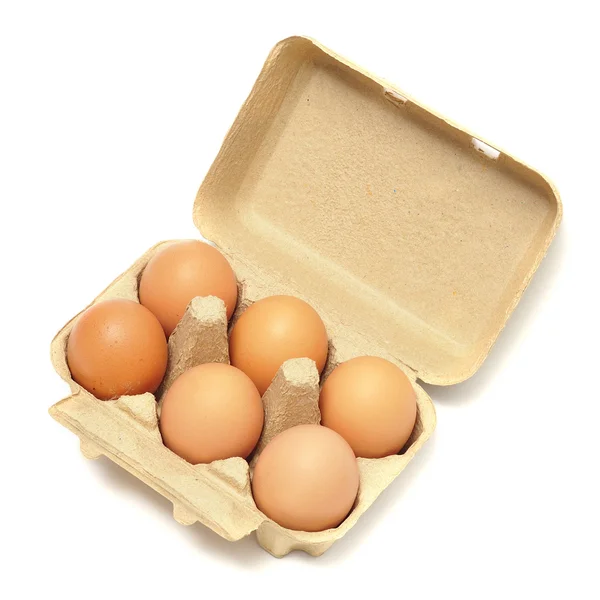 Eggs in the package on white background — Stock Photo, Image
