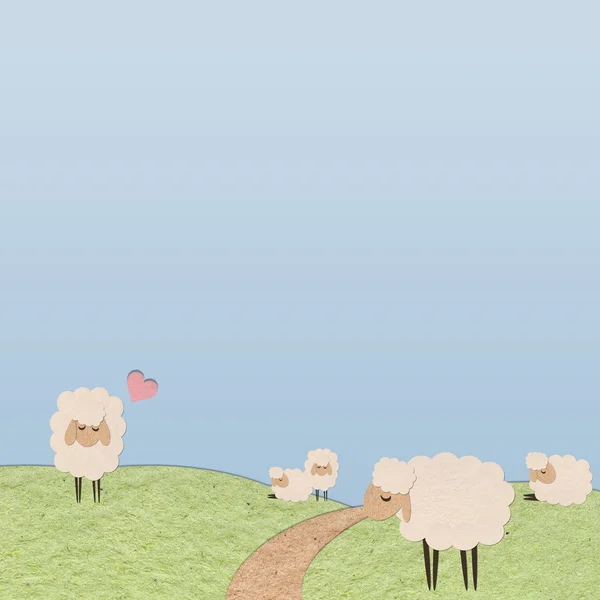 Owce w gospodarstwie papierowe trzymać na kolor tła — Zdjęcie stockowe