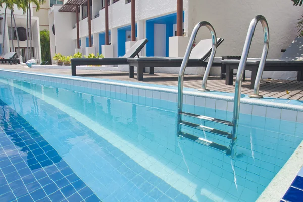 Swimming pool with stair at hotel — Stock Photo, Image