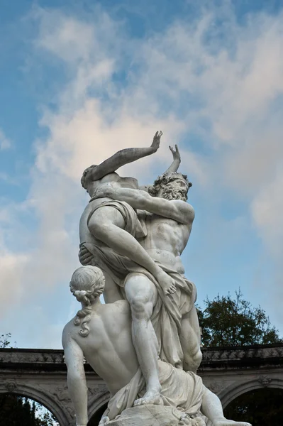 The Rape of Persephone by Pluto (Hades) at the famous palace of Versailles, France. (Sculpture by François Girardon)