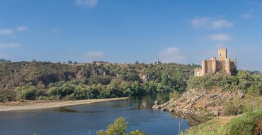Santarem Portugal - 08 09 2022: Panoramic view at the Castle of Almourol is a medieval castle atop the islet of Almourol in the middle of the Tagus River