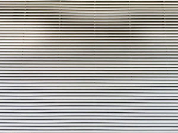 Wall panel texture in the form of a metal grid, used to cover rooms that need air ventilation, HVAC and technical rooms in buildings...
