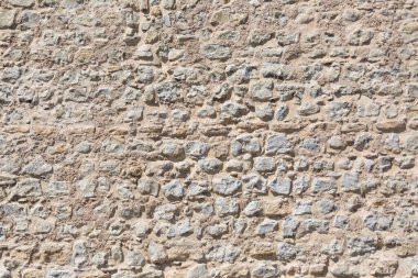 Mimari dokular, geleneksel ve kırsal bir duvarın detaylı görüntüsü, kale duvarında kullanılan granit duvar....