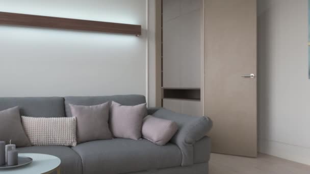 Interior de estilo escandinavo com um grande sofá cinza sem pessoas — Vídeo de Stock