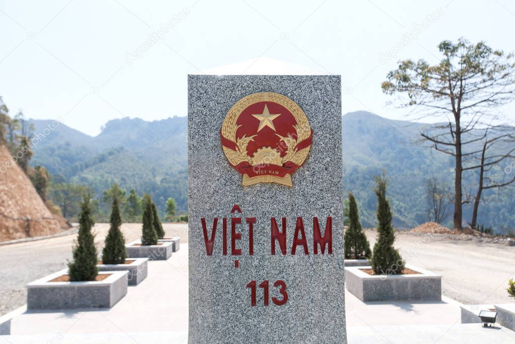 Vietnam marble milestone sign on the 113 national highway near Vietnam-Laos border.