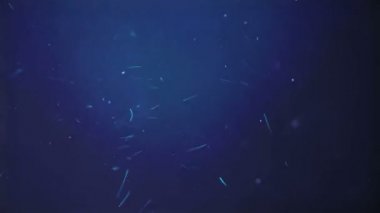 okyanus parçacıklar mavi arka plan.