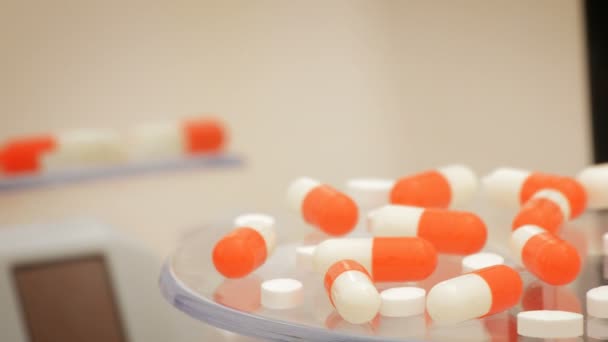 Boucle tournante en capsule orange. Des médicaments. Pilules .