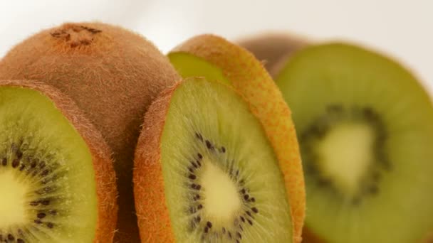 Kiwi-Fruchtscheiben rotieren. Schleife — Stockvideo