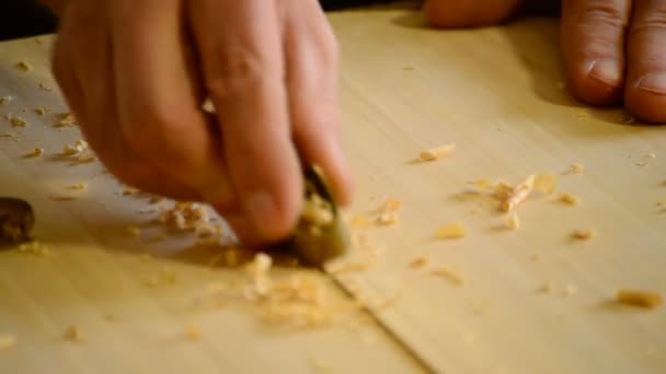 Luthier working in a flamenco guitar with a wood planer — Stock Video