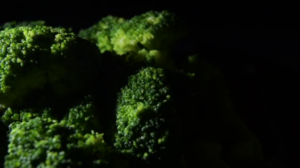 Broccoli Branches Gyrating Black Background — Stock Video