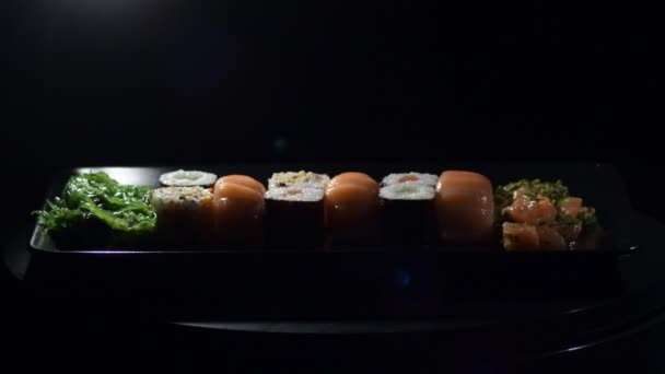 Sushi Rolls Set Salmon Black Tray — Vídeos de Stock