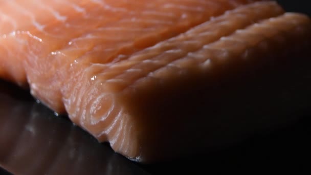 Raw Pink Salmon Fillet Steak Gyrating Intimate Light — Vídeo de stock
