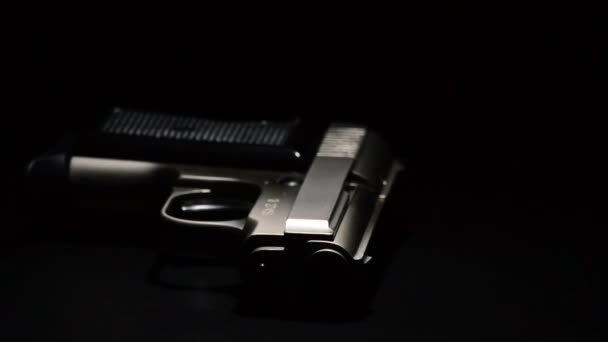 Gun Gyrating Black Background — Stock Video