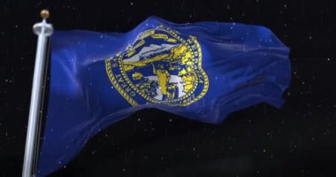 Amerika Birleşik Devletleri 'nin Nebraska eyaletinin bayrağı. Geceleri yağmur yağıyor. Döngü