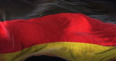 Eski Almanya bayrağı rüzgara karşı sallanıyor. Döngü