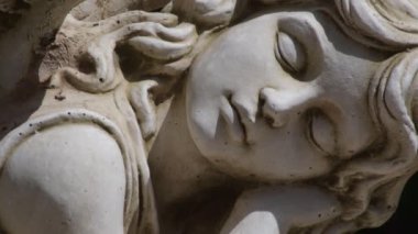 Sleeping angel statue in a cemetery. Macharaviaya, Spain