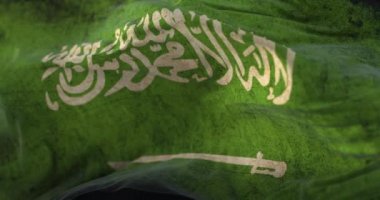 Eski Suudi Arabistan bayrağı rüzgara karşı dalgalanıyor. Döngü