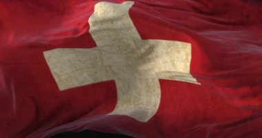 Old Switzerland Flag waving at wind. Loop
