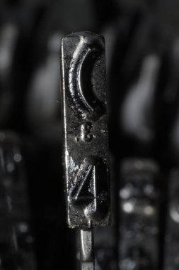 Number 4 in a typo of an old manual typewriter