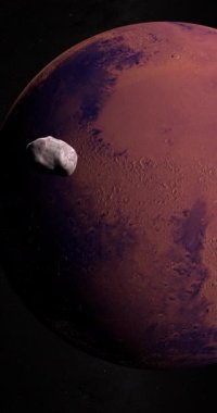 Mars gezegeni yörüngesindeki uydu Phobos dış uzayda. 4K Dikey