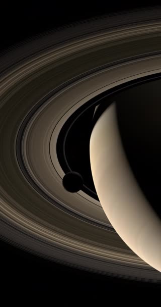 Luna Orbita Attorno Pianeta Saturno Suoi Anelli Nello Spazio Verticale — Video Stock