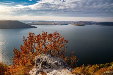 Beautiful view of Bakota Bay on the Dniester River in autumn day.  clipart