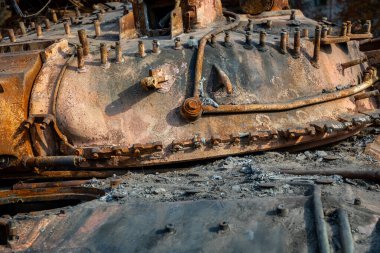 Destroyed military equipment of Russia in the war with Ukraine. Burnt Russian tank.