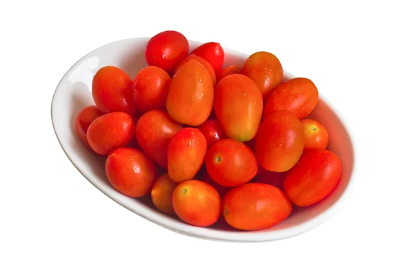 Red tomatoes in a white bowl. — Stock Photo, Image