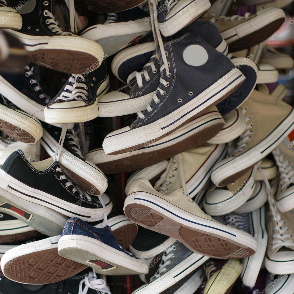 Used sneakers. — Stock Photo © nirutdps 31087573