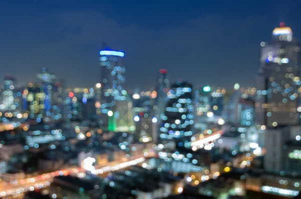 Vista del paisaje urbano con luces borrosas — Foto de Stock
