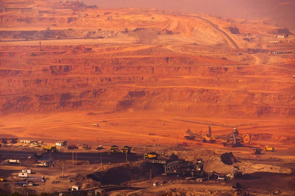 Large machinery and vehicles Mining and transporting coal from mines to generate electricity. Mae Moh Coal Power Plant, Lampang.