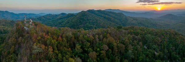 Aerial view of dense forest in autumn . Autumn leaves in the forest. Pangpuai, MaeMoh, Lampang, Thailand.