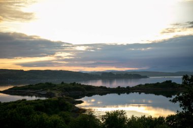 Cloudy sunset over the Loch Shuna in Scotland