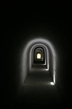 Tunnel in the darkness with lights. Alcala del Jucar. Albacete