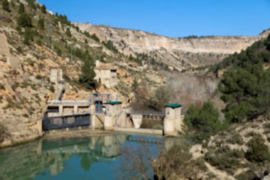 Scenic landscape view of the canyon with the dam over the river Jucar. Alcal del Jcar Trekking